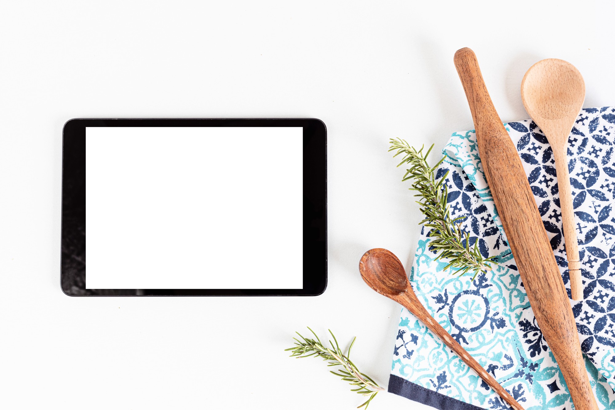 flat lay of recipe cards and a tablet showing a lesson